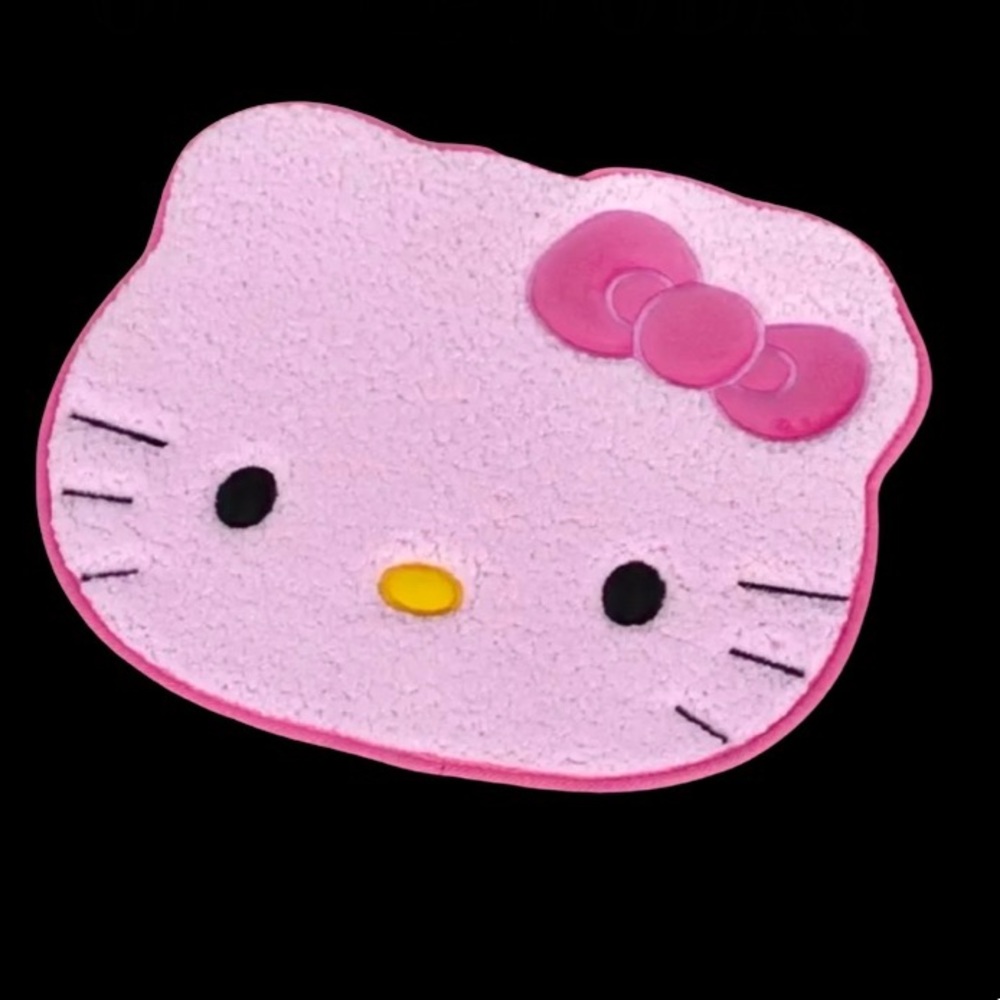 Hello kitty’s face as the design on her doormat
